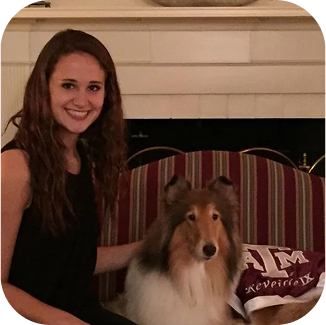 Reveille on couch with student