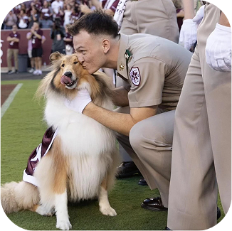 Reveille with cadet handler